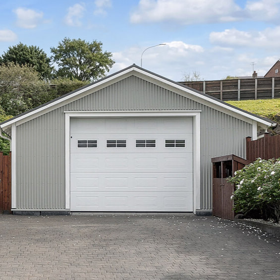 SELT / SOLD Bílskúrshurð / Iðnaðarhurð, H260 x B350 sm.